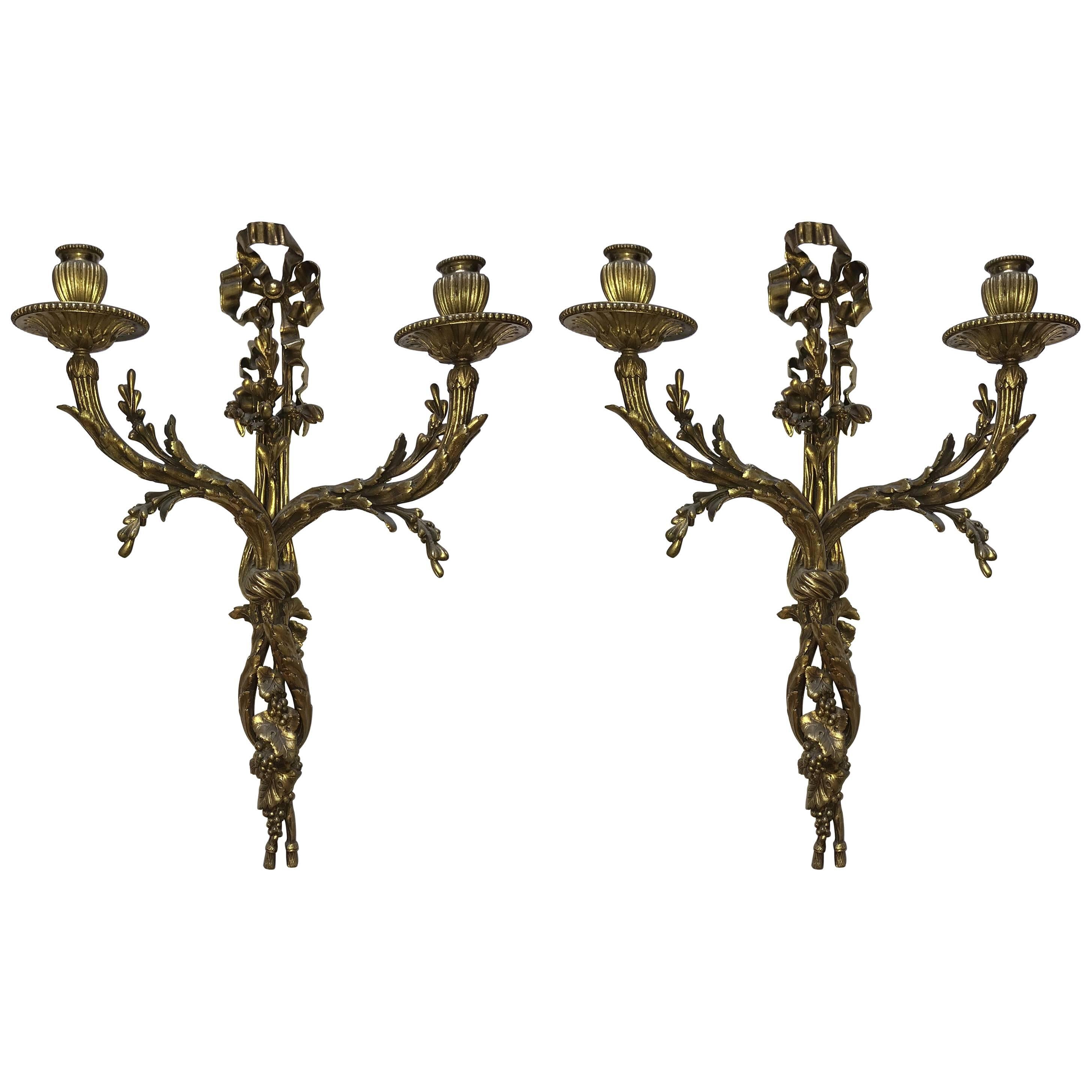 Fine Pair of Elegant French Doré Bronze Two-Arm Bow Top Tassel Filigree Sconces For Sale