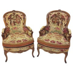 Fine Pair of French Carved Walnut Framed Fauteuils