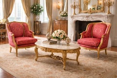 Paire de chaises bergères Louis XVI en noyer naturel