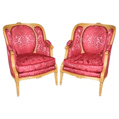 Fine Pair of French Louis XVI Bergere Chairs in Natural Walnut
