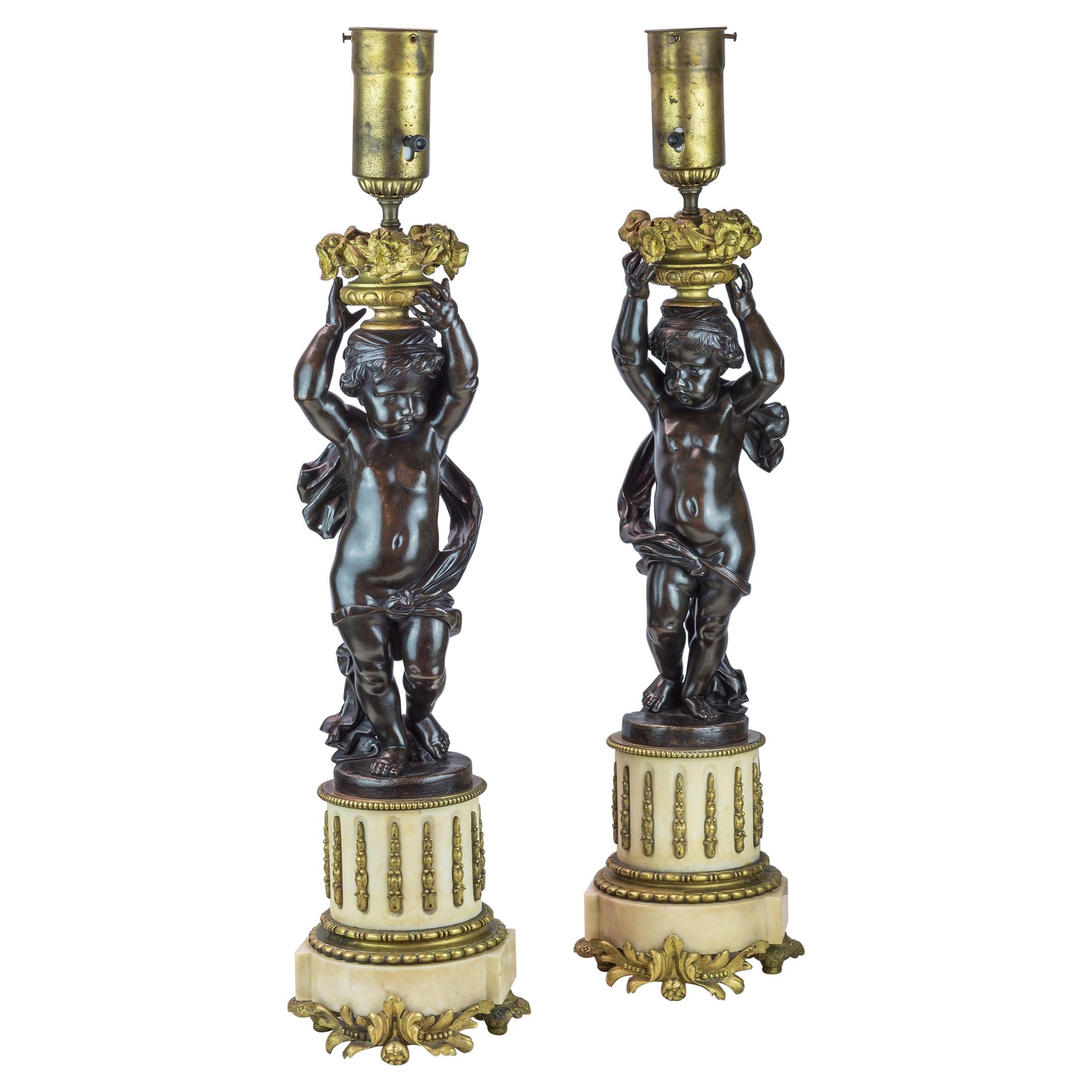 Fine Pair of French Patinated Bronze and Gilt Metal Figural Lamps
