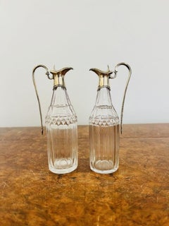 Fine pair of George III hallmarked silver and glass oil and vinegar bottles