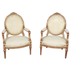 Fine Pair of Gilded over Italian Red Bole French Louis XVI Armchairs