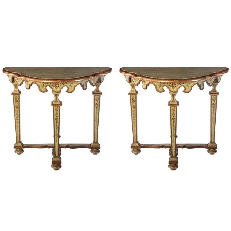 A fine pair of Italian, 18th century painted and parcel-gilt console tables.
 Very good  original condition.

Measurements: consoles Cm 80 x 50 x 95
 