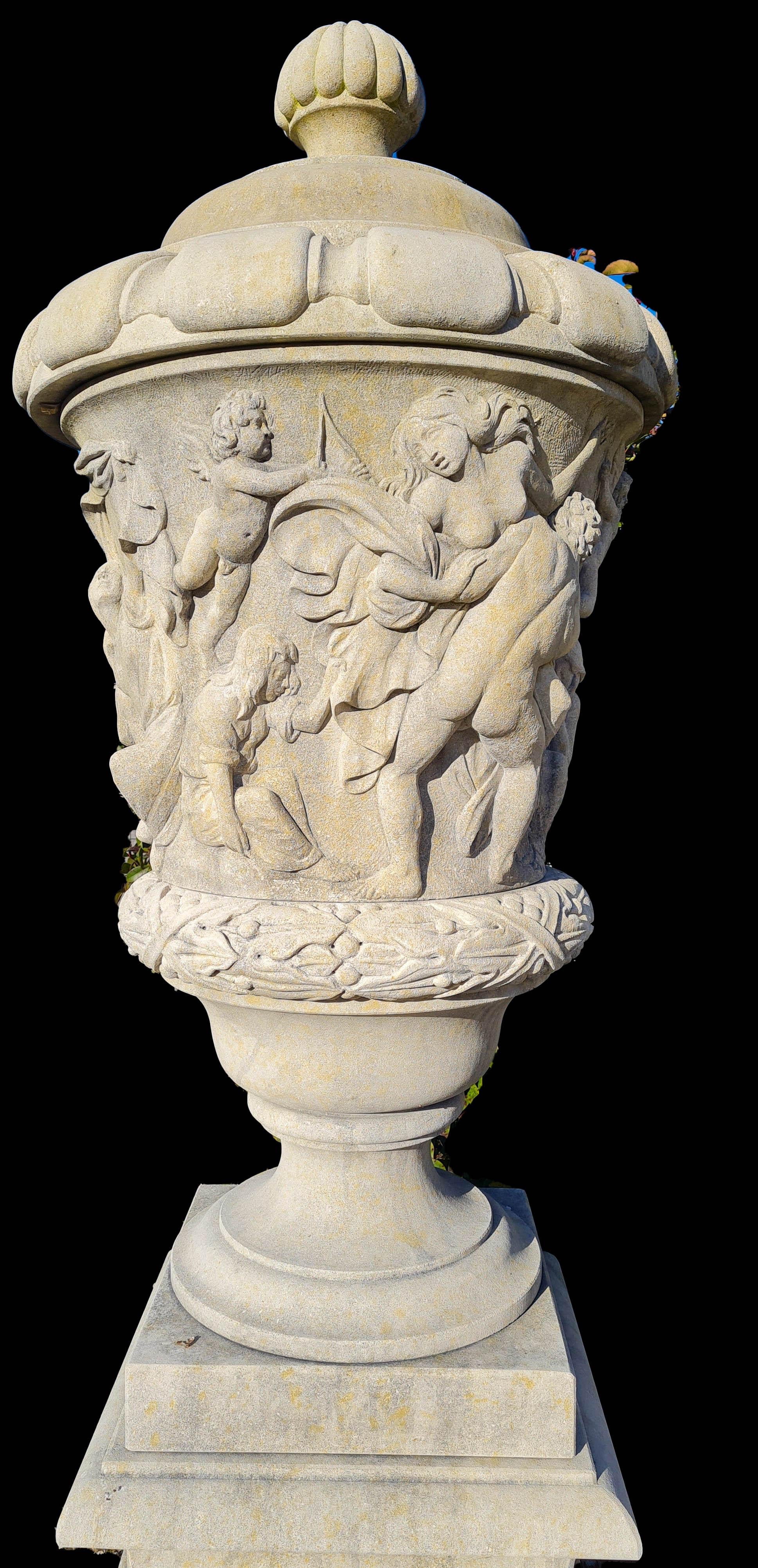 Elegant stone vases on base, decorated with finely carved mythological scenes.
 Timeless decoration for you garden or interior.
 