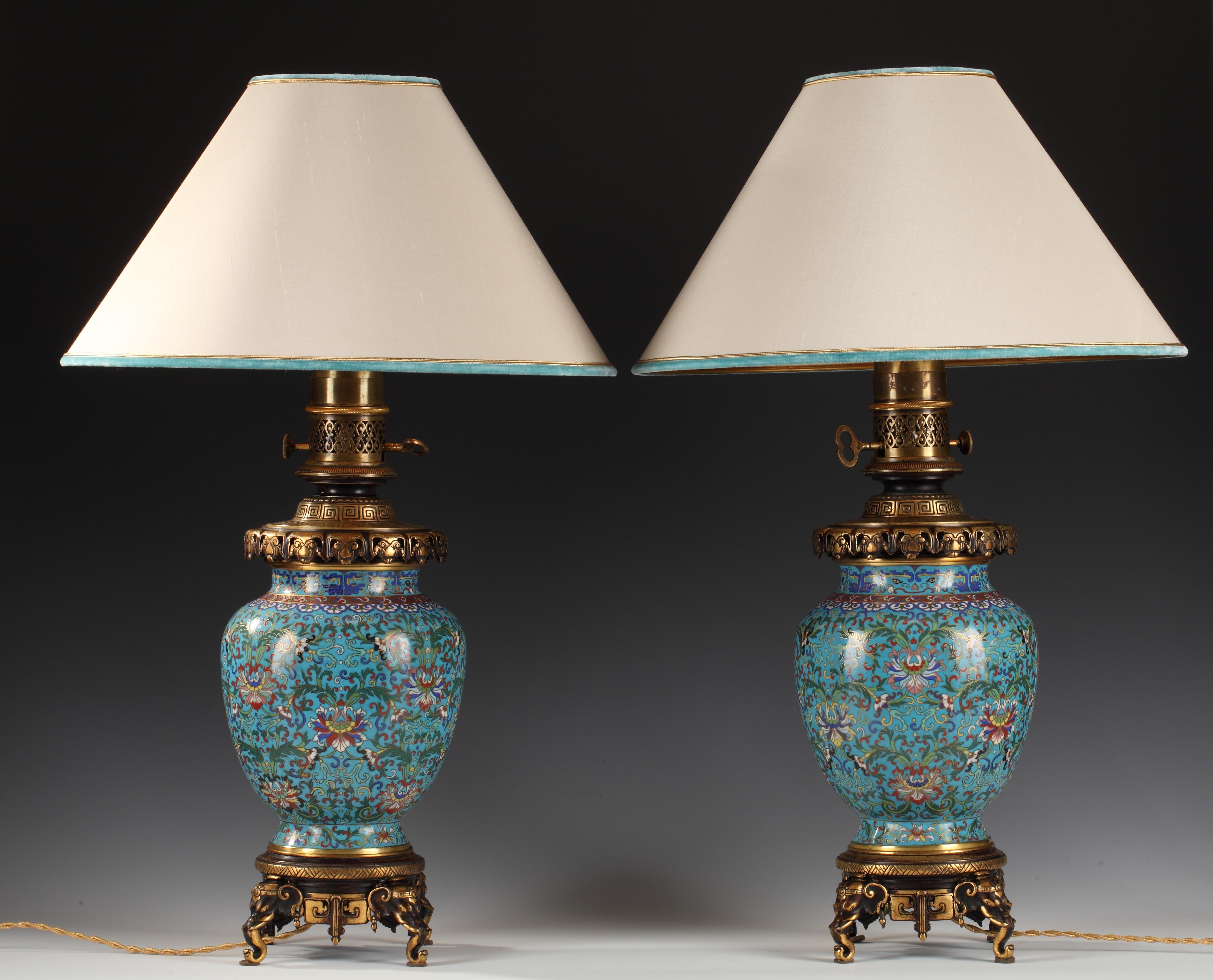 Signed twice Gagneau on the bronze light fittings. 

Pair of Chinese cloisonné enamel lamps with polychrome foliate patterns, mounted in gilded and patinated bronze mounts. The neck is enriched with openwork mounts, and Greek frieze, and Chinese