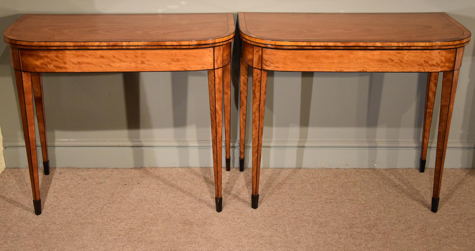 A fine pair of late 18th century satinwood card tables, circa 1785.

Measures: Height 30