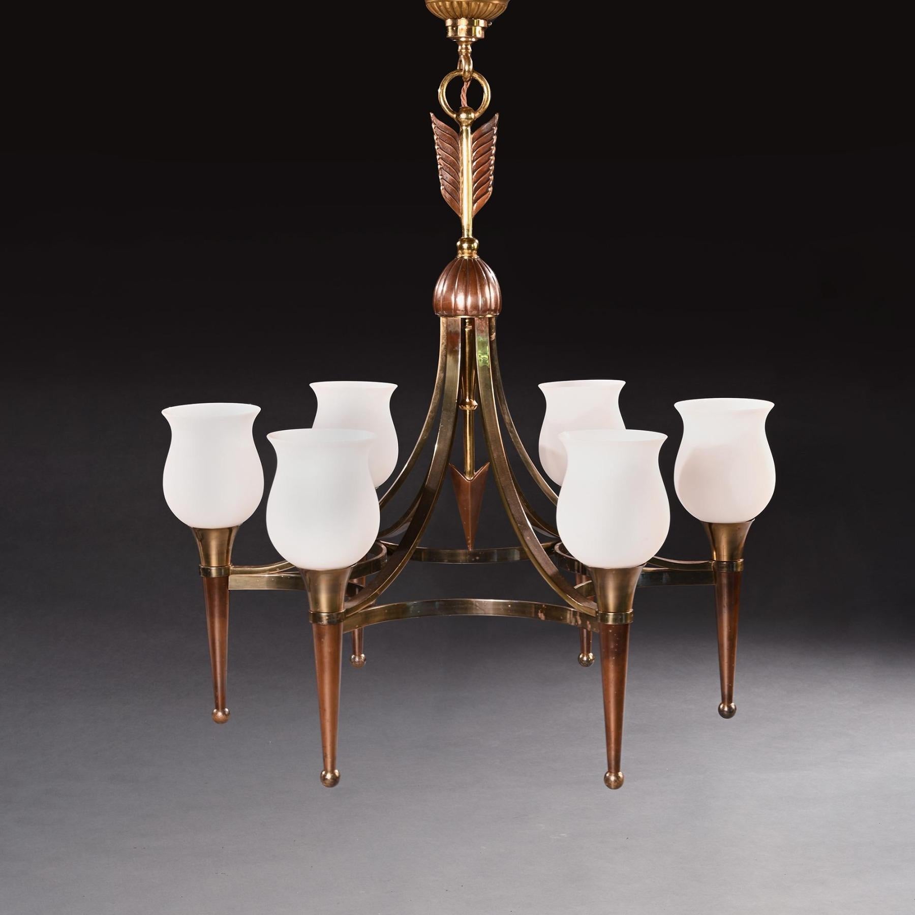 A very finely made pair of Mid Century chandeliers after a design attributed to Andre Arbus, most probably made by Maison Jansen

French Circa 1950

These chandeliers take cupid's arrow as their central design motif, the knop and arms extending from