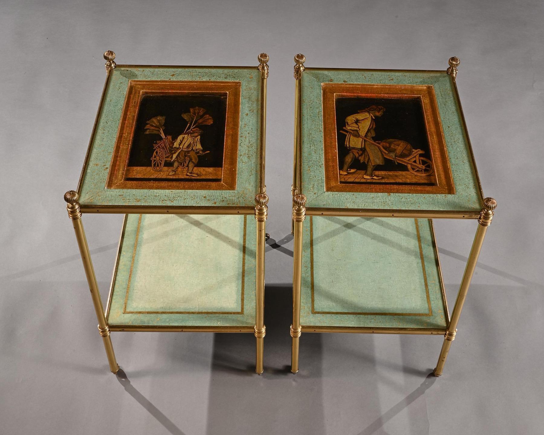 Fine pair of mid 20th century two tier lacquered and parcel gilt green craquele etageres with inset lacquered panels by Mallett London.



England circa Mid 20th Century 



Each rectangular top having recessed lacquered panels above inset