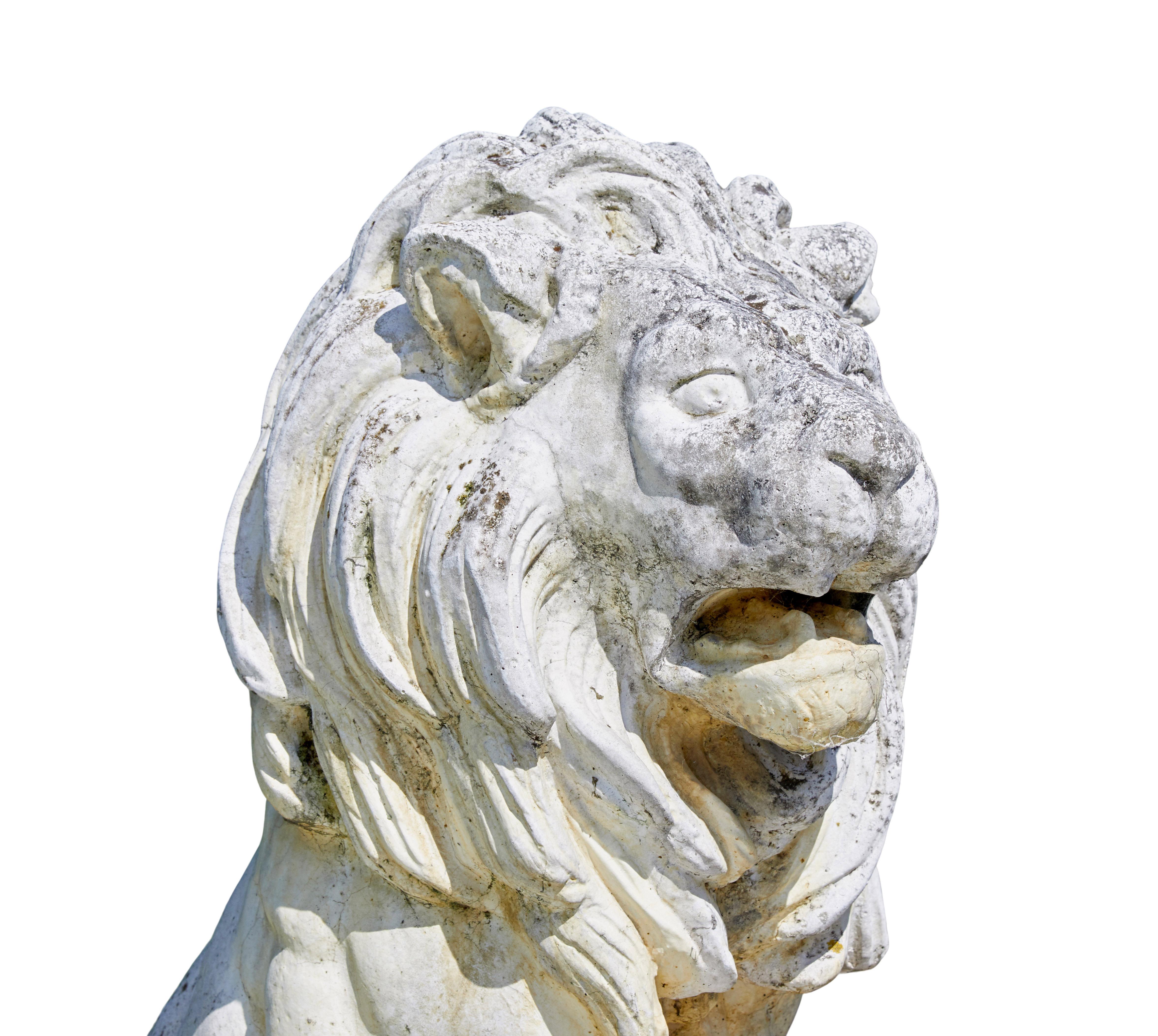 Stone Fine pair of mid century carved stone lion statues For Sale