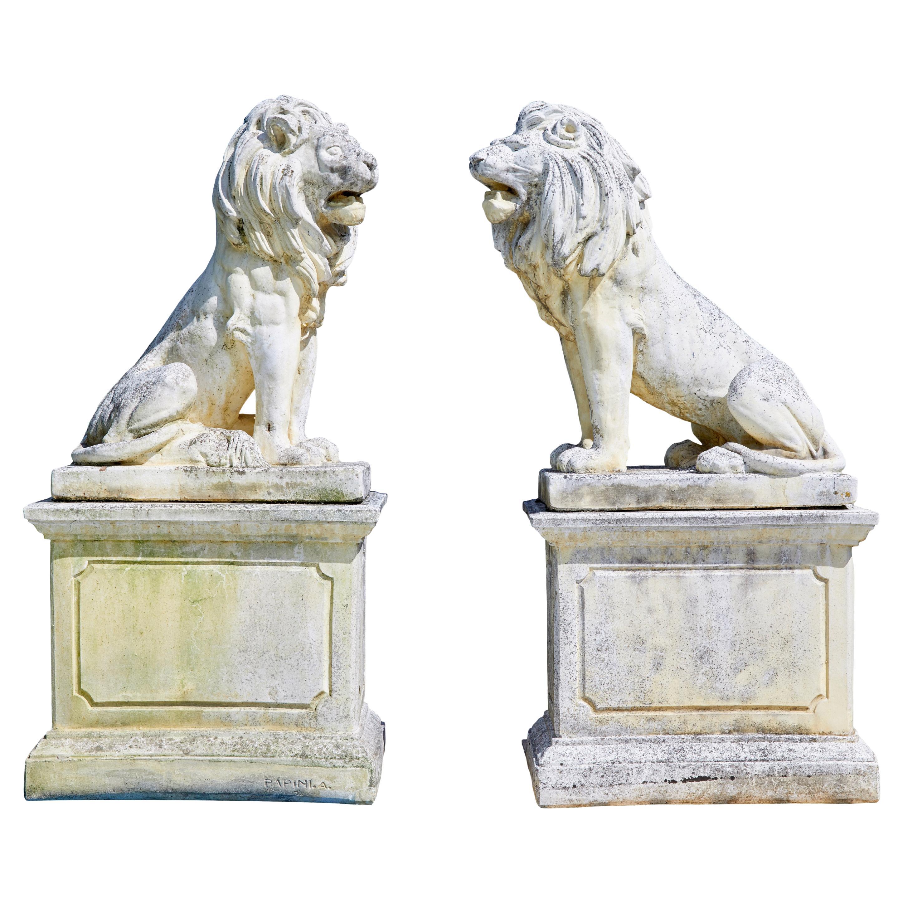 Fine pair of mid century carved stone lion statues For Sale