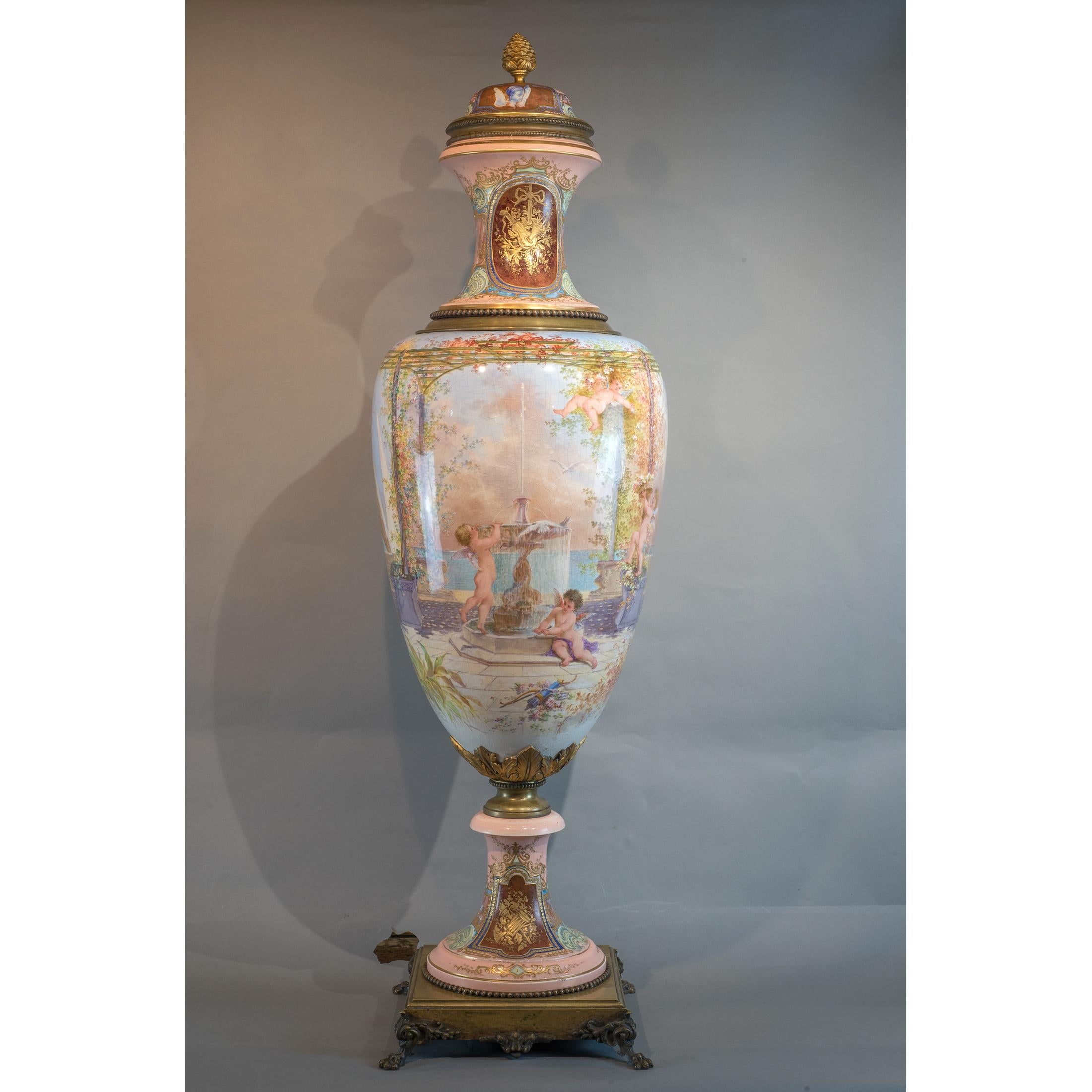 French  Pair of Monumental Sèvres and Gilt Bronze-Mounted Vase by Fuchs For Sale