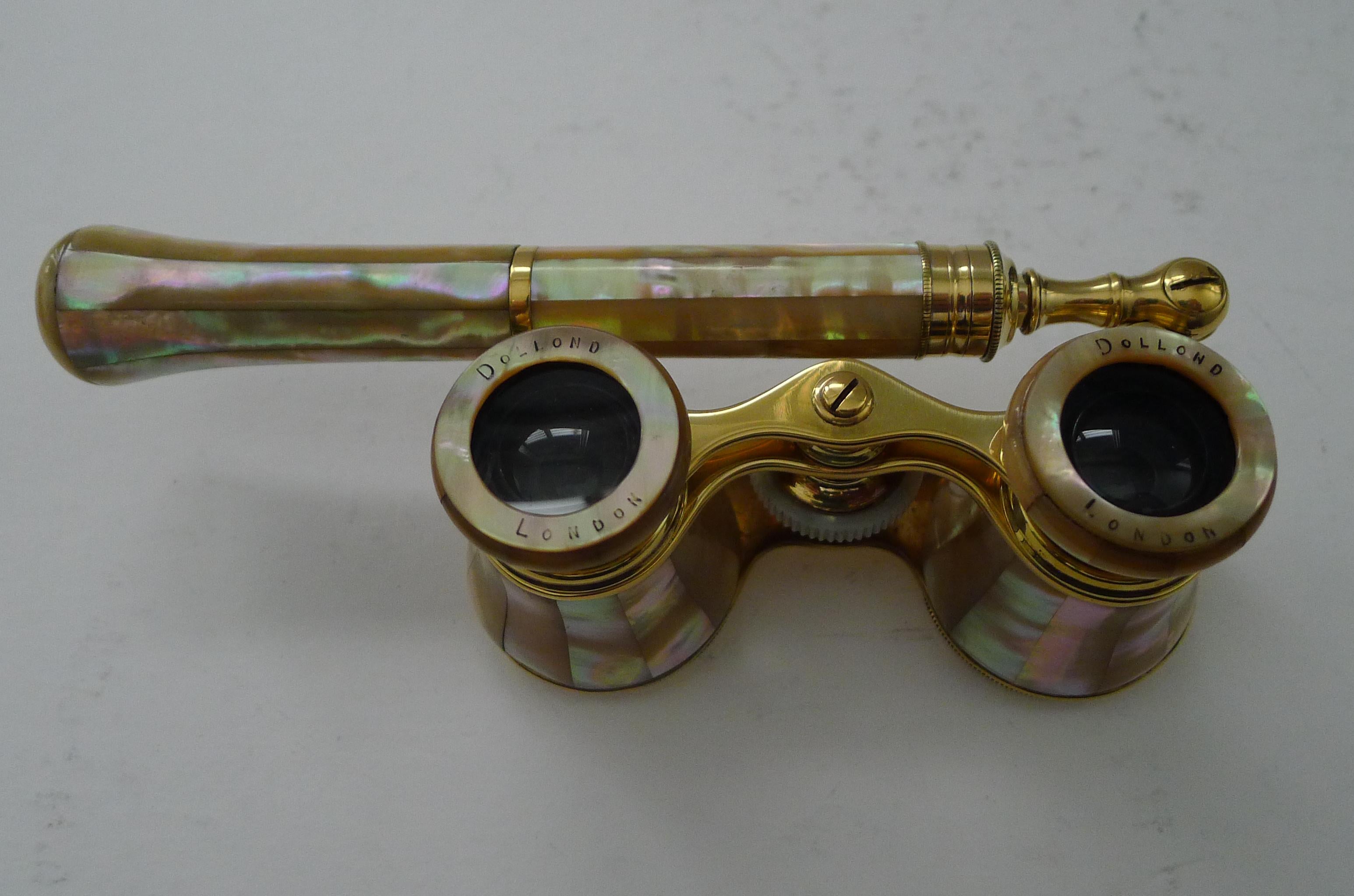 A splendid pair of Edwardian Opera / Theatre glasses professionally re-polished to gleam, making them as good as they would have looked over 100 years ago.

This is a pair with a telescopic lorgnette handle. All is wrapped in wonderful Mother of