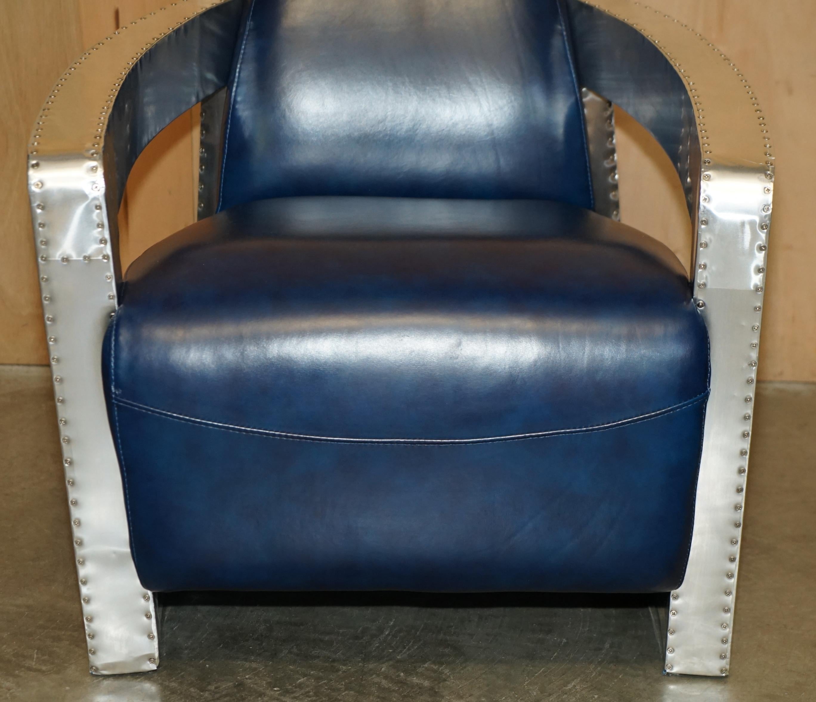 Alluminio UN BEL PAIO DI POLTRONE AVIATOR ROCKET IN PELLE BLU NAPOLEONICA E ALLUMINIO LUCIDO in vendita
