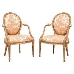Fine paire de fauteuils d'époque George III sculptés et dorés