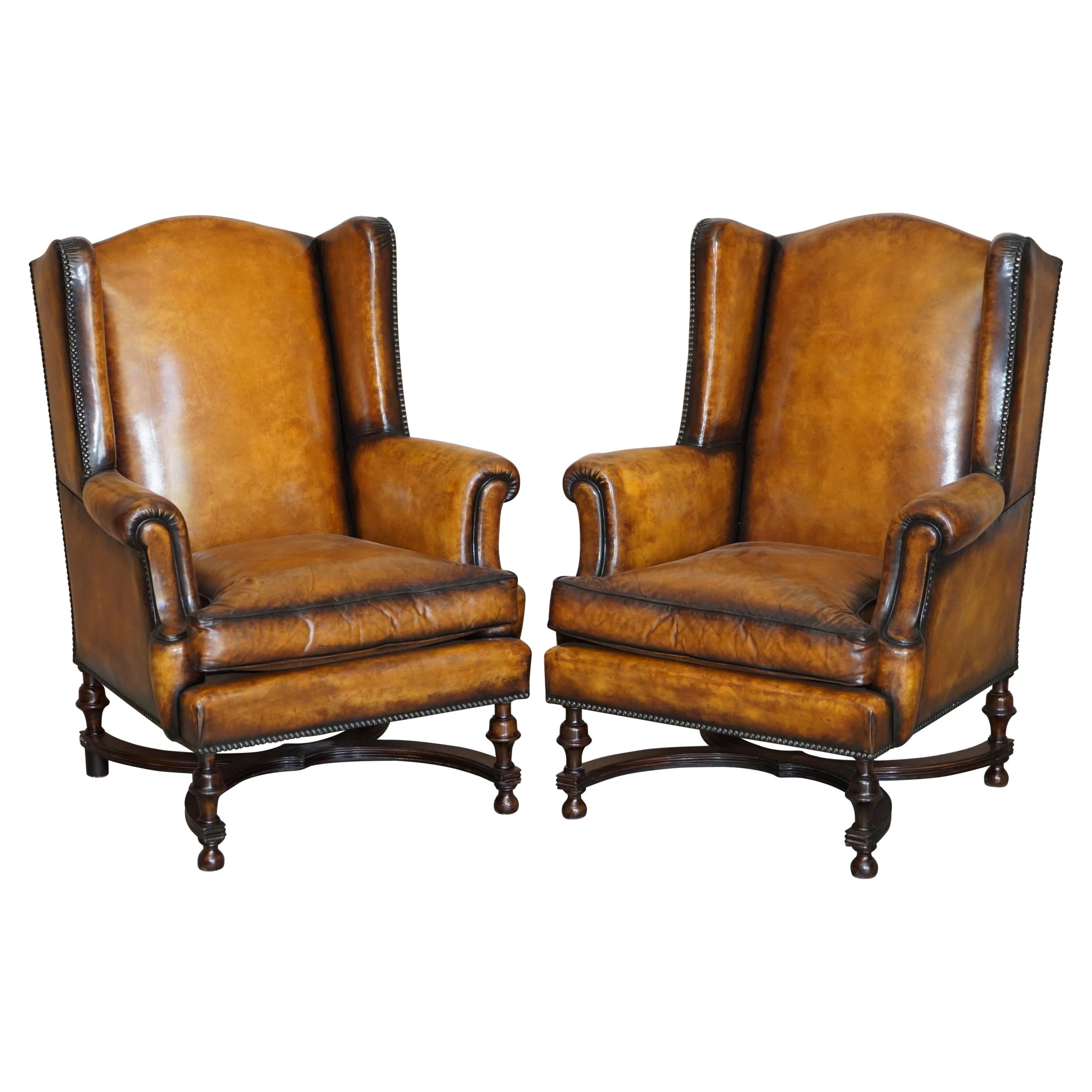 Fine Pair of Restored 1880 William & Mary Style Brown Leather Wingback Armchairs