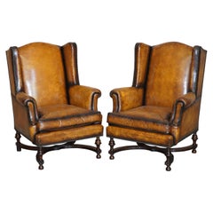 Fine Pair of Restored 1880 William & Mary Style Brown Leather Wingback Armchairs