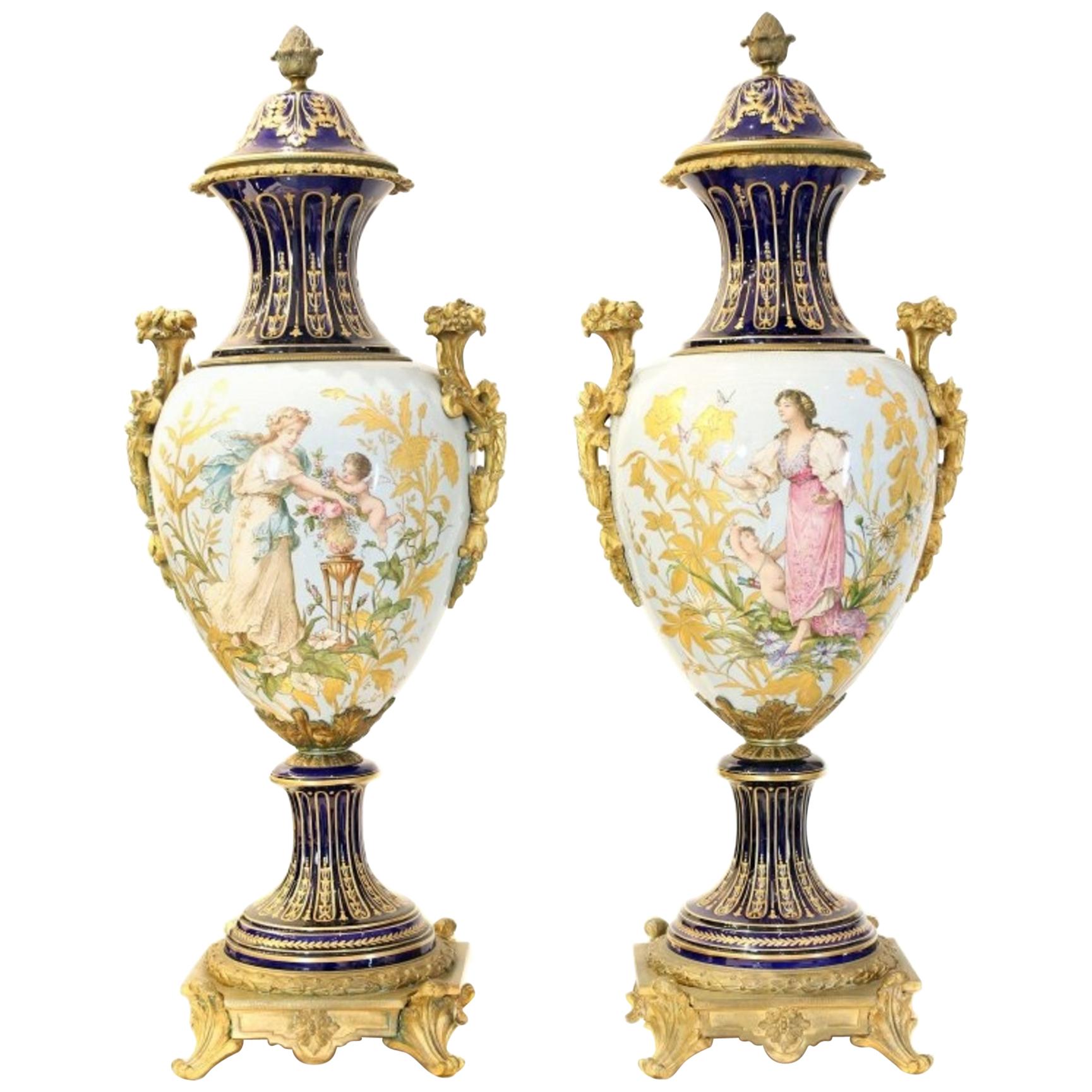 Fine Pair of Sevres Gilt Bronze-Mounted Painted, Parcel-Gilt Porcelain Vases
