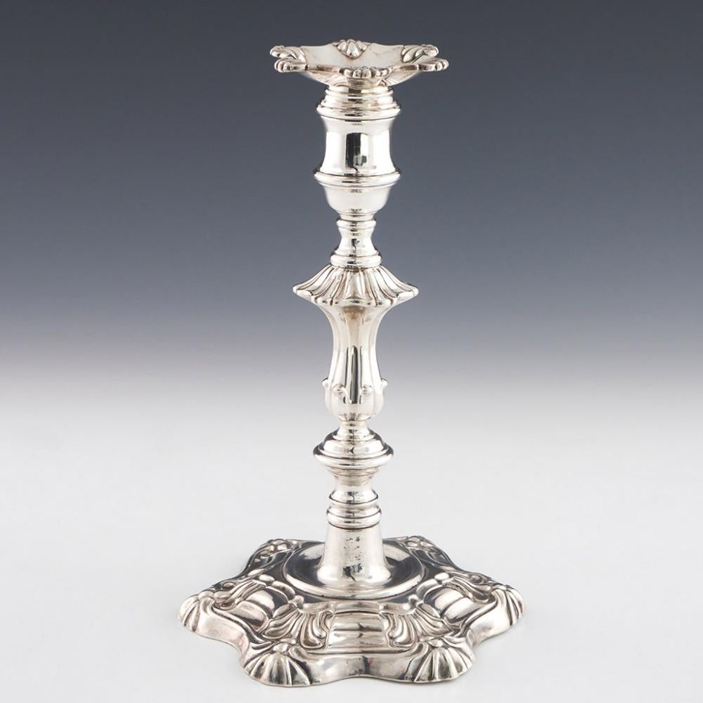 Heading : Fine pair of sterling silver George IV Candlesticks
Date : Hallmarked in Sheffield, Yorkshire for S C Younge & Co in 1827
Period : Georgian
Origin : Sheffield; England
Decoration : Hexagonal feet with broad, lobed moulding; a series of