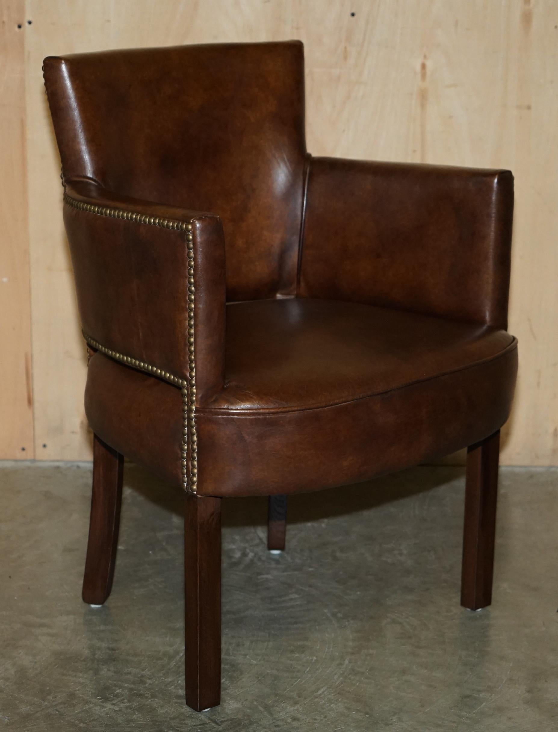 Royal House Antiques

Royal House Antiques is delighted to offer for sale this stunning pair of vintage Halo Heritage brown leather tub armchairs which can be used as occasional chairs or dining chairs 

Please note the delivery fee listed is just a