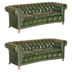 Fine Pair of Vintage Regency Green Leather Serpentine Fronted Chesterfield Sofas