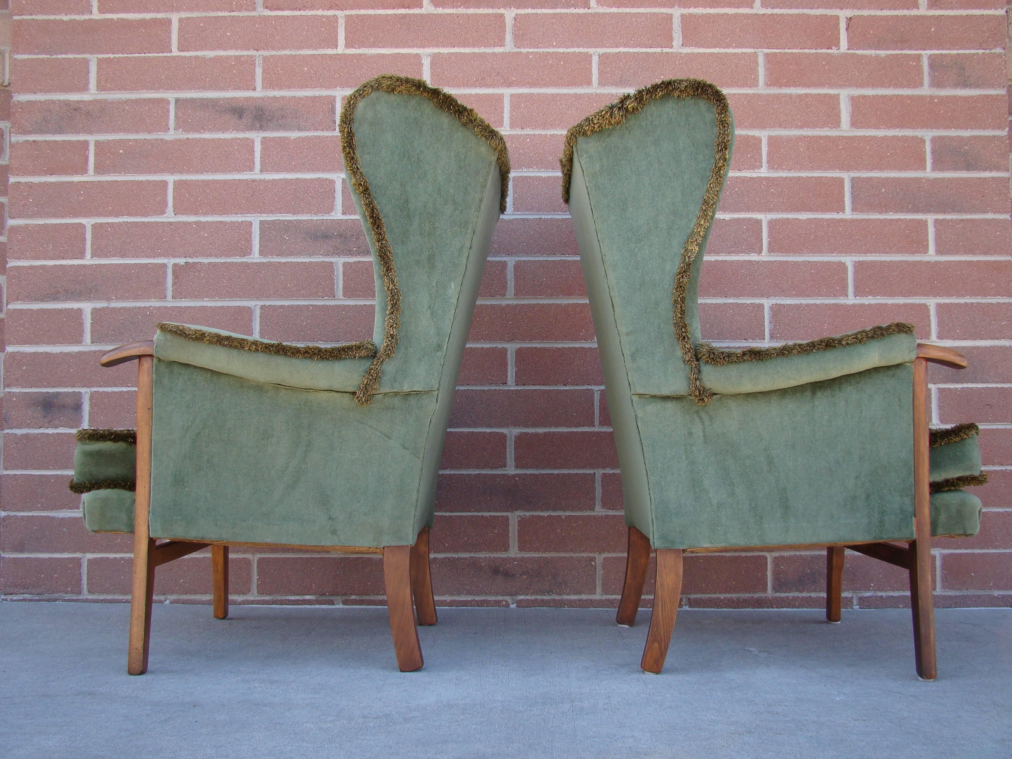 Mid-Century Modern Fine Pair of Vintage Scandinavian Wingback Chairs with Exposed Walnut Detail For Sale