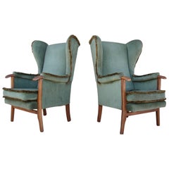 Fine Pair of Vintage Scandinavian Wingback Chairs with Exposed Walnut Detail