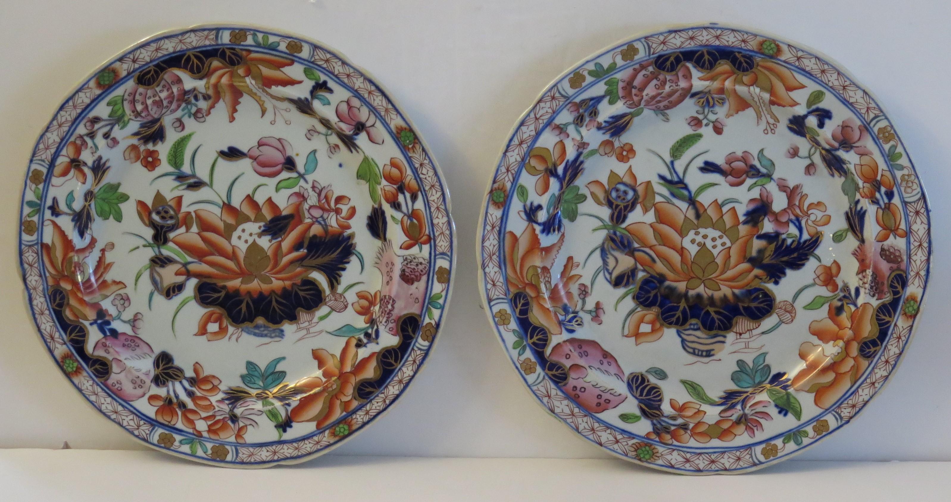 These are a very good pair of early Mason's Ironstone pottery Dinner Plates in the very decorative Water Lily pattern, produced by the Mason's factory at Lane Delph, Staffordshire, England, circa 1813-1820.

The plates are circular with radial