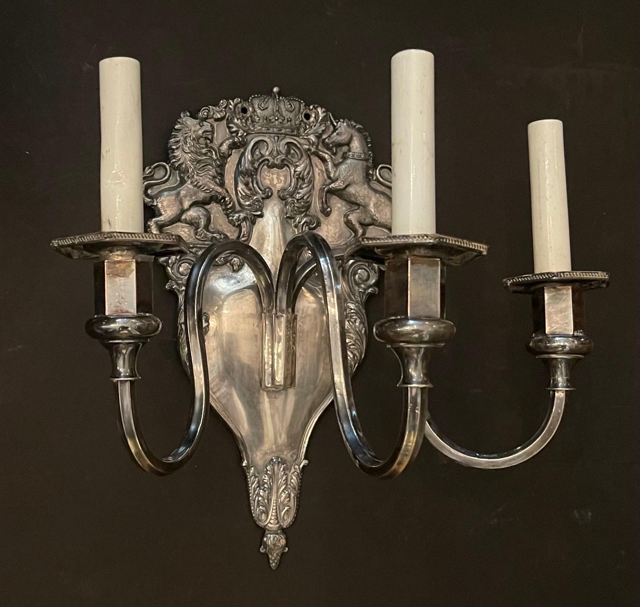 A fine pair of sheffield English silver plated lion, unicorns, horse shield back 3 candelabra light sconces.