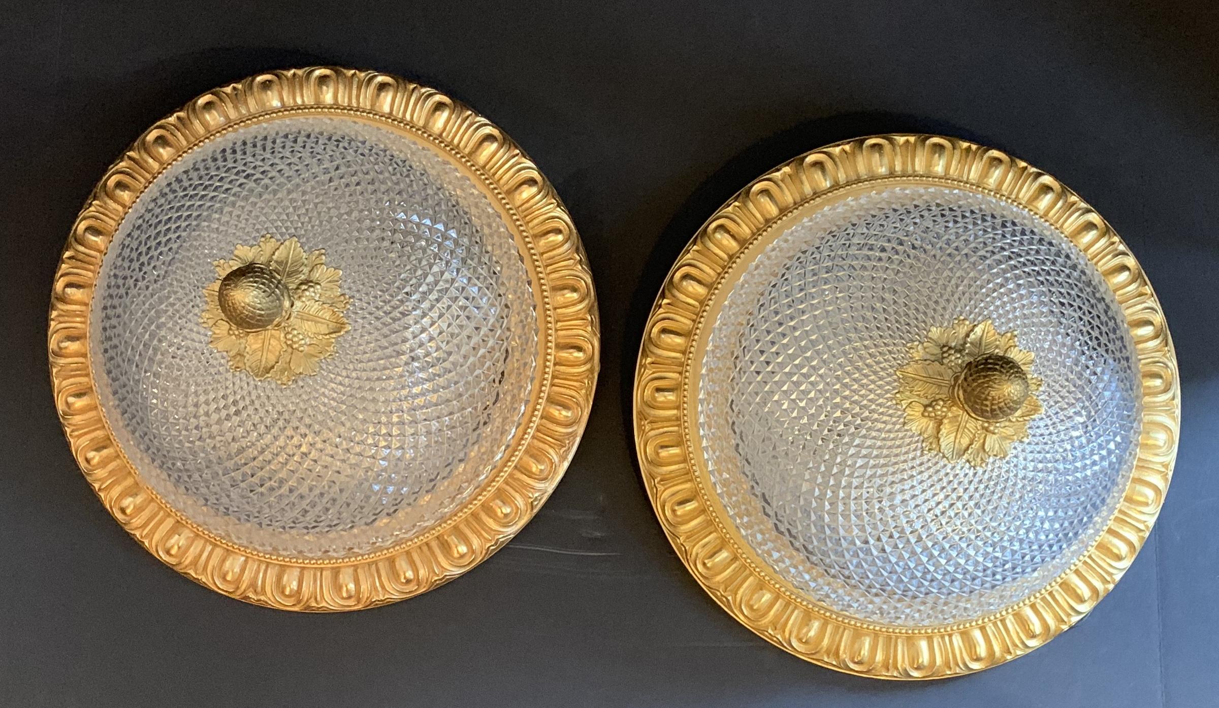 A fine pair of Sherle Wagner egg and dart flush mount bronze and crystal / glass acorn finial fixtures
Each with Edison lights inside.

Each sold separately.
 