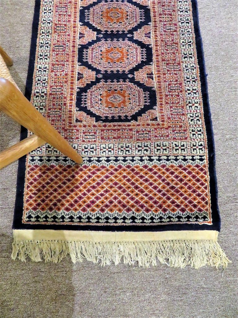 Fine Pakistani Bokhara Semi-Antique 10+ feet Hand-Knotted Carpet Runner 1970s In Good Condition For Sale In Miami, FL
