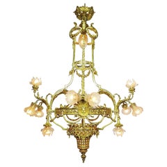 Magnifique et somptueux lustre français de style Louis XIV en bronze doré, datant des XIXe et XXe siècles