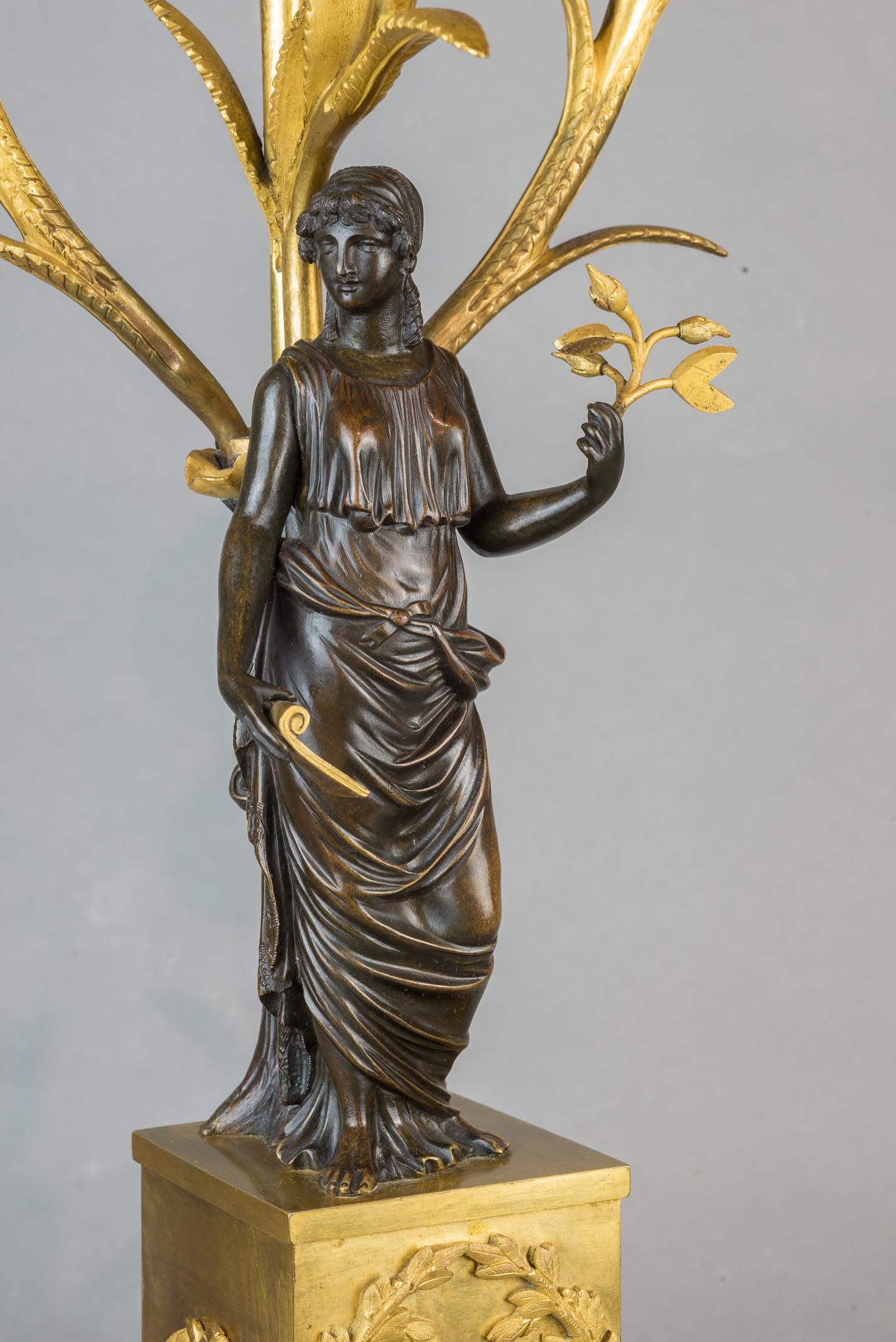 Fine Patinated and Gilt Bronze Three-Light Figural Candelabras For Sale 1