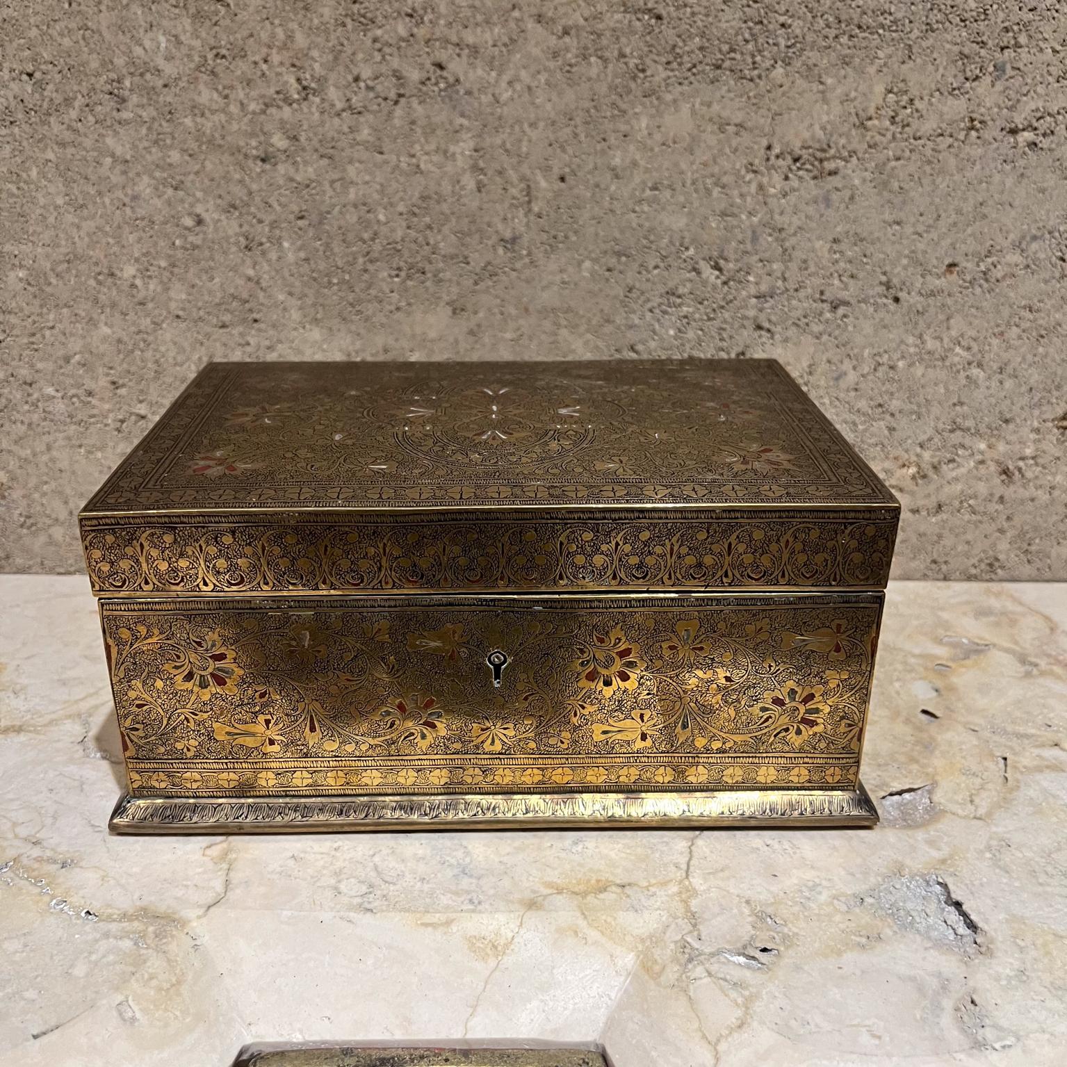 AMBIANIC presents
Vintage Patinated Brass Safe Keeping Box Cigar Cigarette Jewelry
Floral vine ornamentation
Hinged and Lined
Style Of Tiffany
4 h x 8.5 w x 5.75 d
Original Vintage
See images for condition