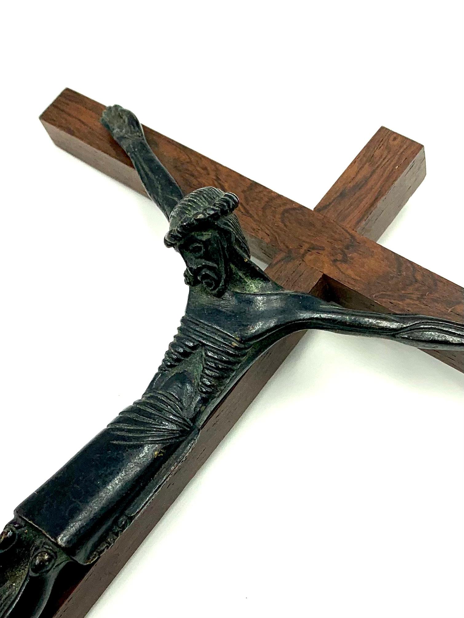 Fine patinated bronze Chrucifix by Jean Lambert-Rucki, 1888-1967
Circa 1930 
The figure of Christ thoughtfully, expressively modelled with stylized Avant Garde elements. Elongated, powerful, fluid arm muscels, a geometric ribcage, square formal