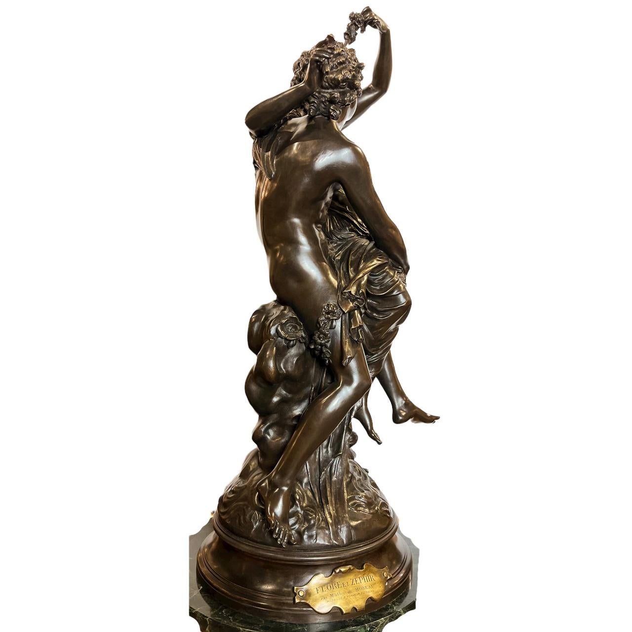 Artist: Mathurin Moreau (FRENCH, 1822-1912)
Medium: bronze, dark brown patina
Dimensions: 33.25 in x 14 in
Signed 'Mthrin Moreau' (to the base), rotating base applied with engrave plaquette 'FLORE ET ZEPHIR / PAR Mathurin MOREAU / MEDAILLE