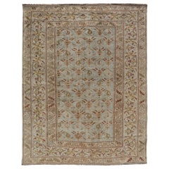 Tapis persan ancien Afshar en vert, brun et bleu tribal