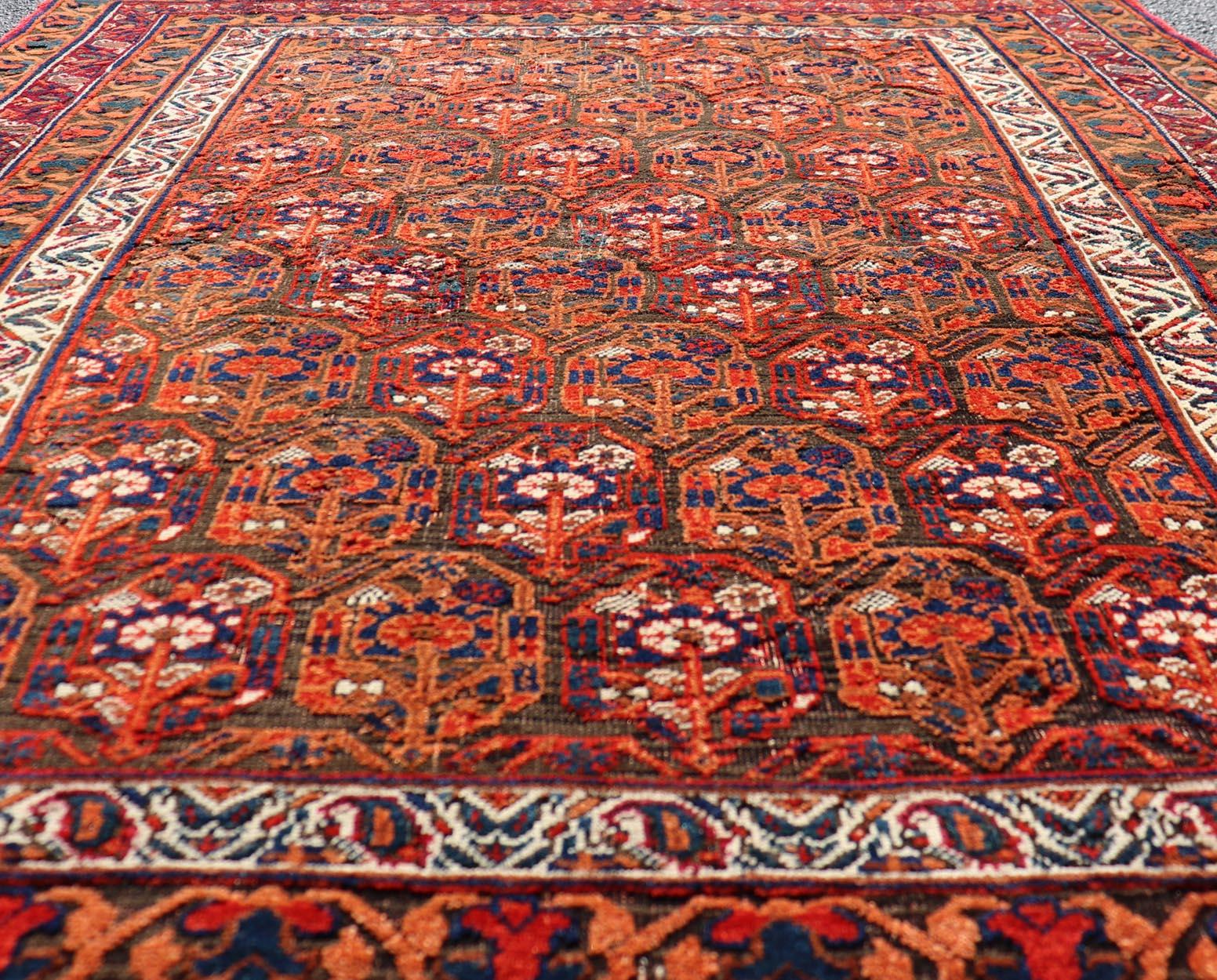  Fine Persian Antique Afshar Rug in Orange and Copper Background & Multi Colors. Keivan Woven Arts/ Rug/X23-0812-93, Antique Afshar Early 20th Century. 
Measures: 4'2 x 5'2 
Unique Botanical, rich symbolism, and fine intricacy contribute to the