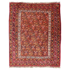 Tappeto persiano antico Afshar con sfondo arancione e rame e colori multipli