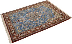 Fine Persian Isfahan Rug with silk, blue field, 7.2 x 5.2 ft