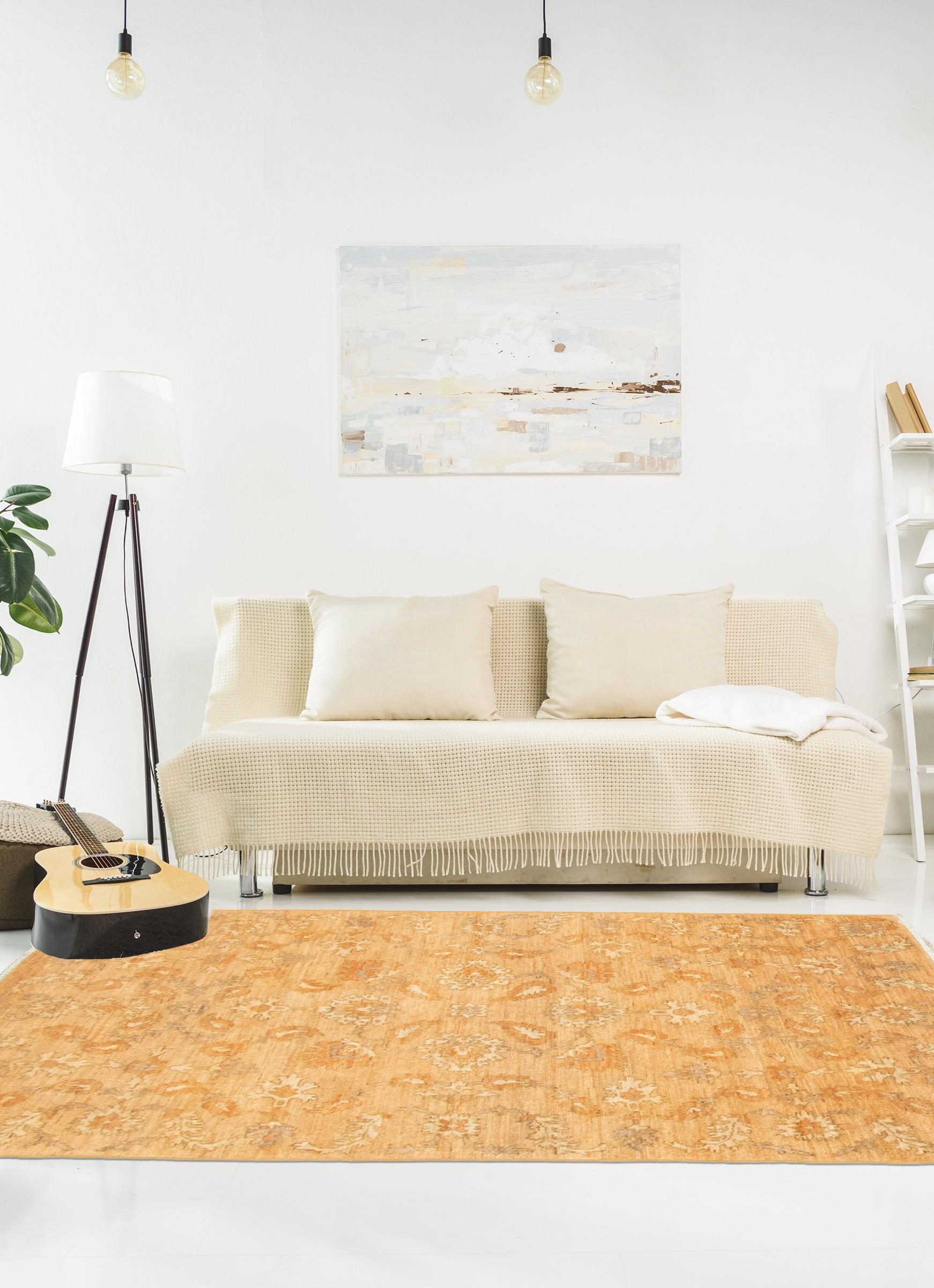 Detailed by bright and inviting shades of soft tan, orange, and cream blonde wool, this hand-knotted carpet measures 4'1