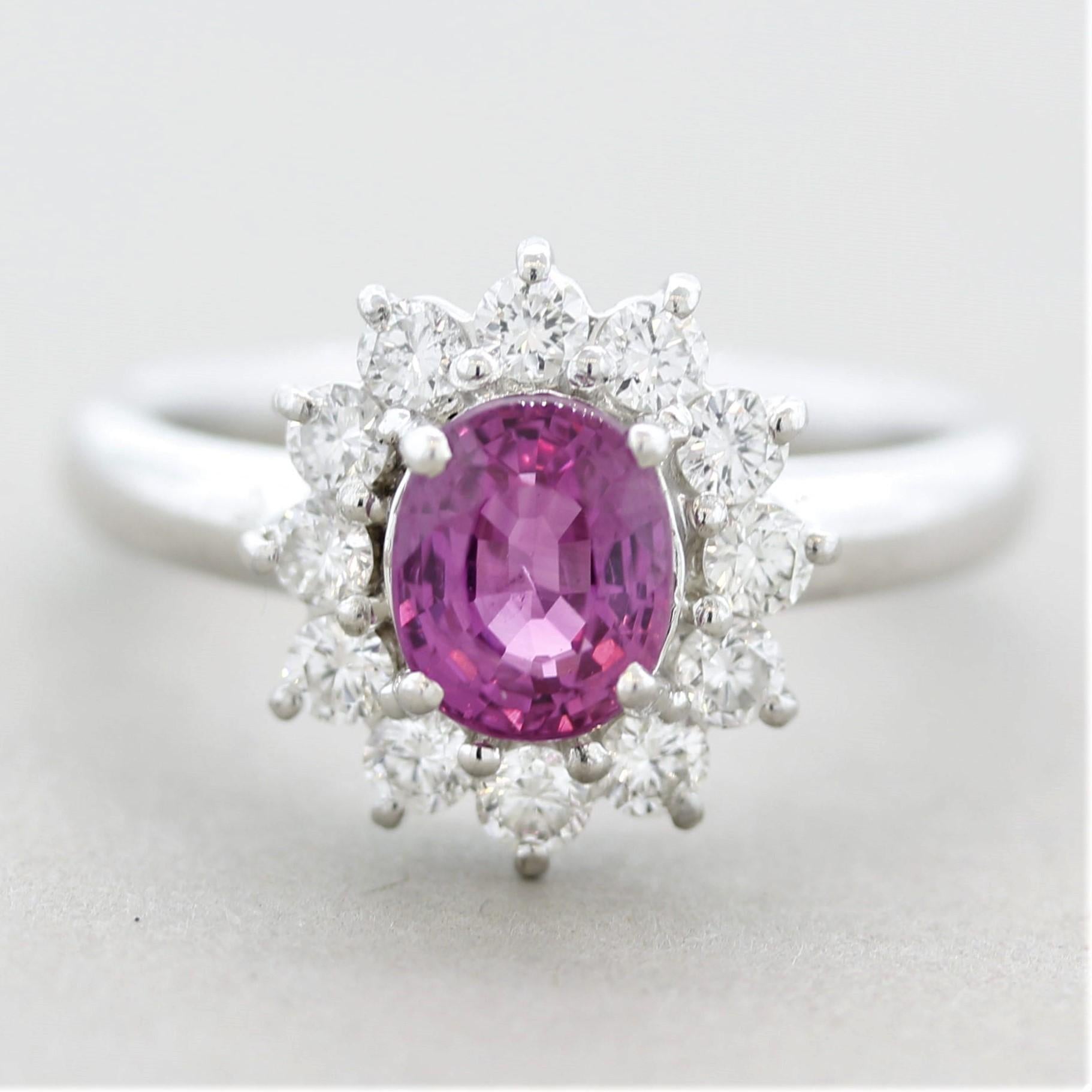 A smaller yet extremely fine fancy pink sapphire! It weighs 1.53 carats and has an amazing vivid intense pink color with hints of purple adding to the saturation. It has an excellent oval shape and free of any inclusions allowing light to enter and