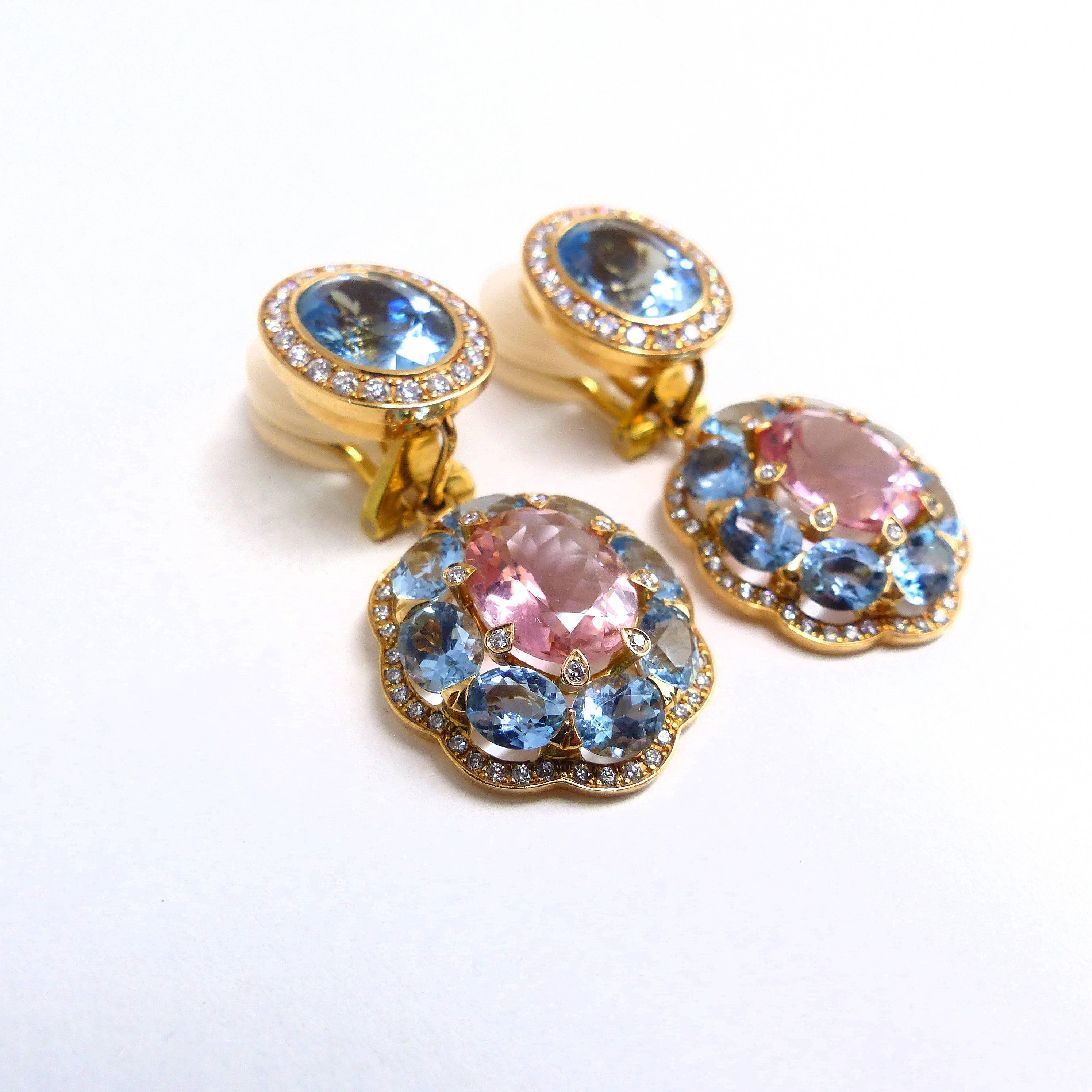 Thomas Leyser is renowned for his contemporary jewellery designs utilizing fine gemstones. 

This 18k rose gold (17.52g) pair of earrings is set with 2x fine pink Tourmalines (facetted, oval, 10x8mm, 4.84ct) + 16x Aquamarines (facetted, oval, 5x4mm,