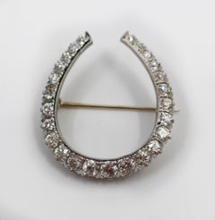 Fine Platinum Diamond Horseshoe Brooch, circa 1925