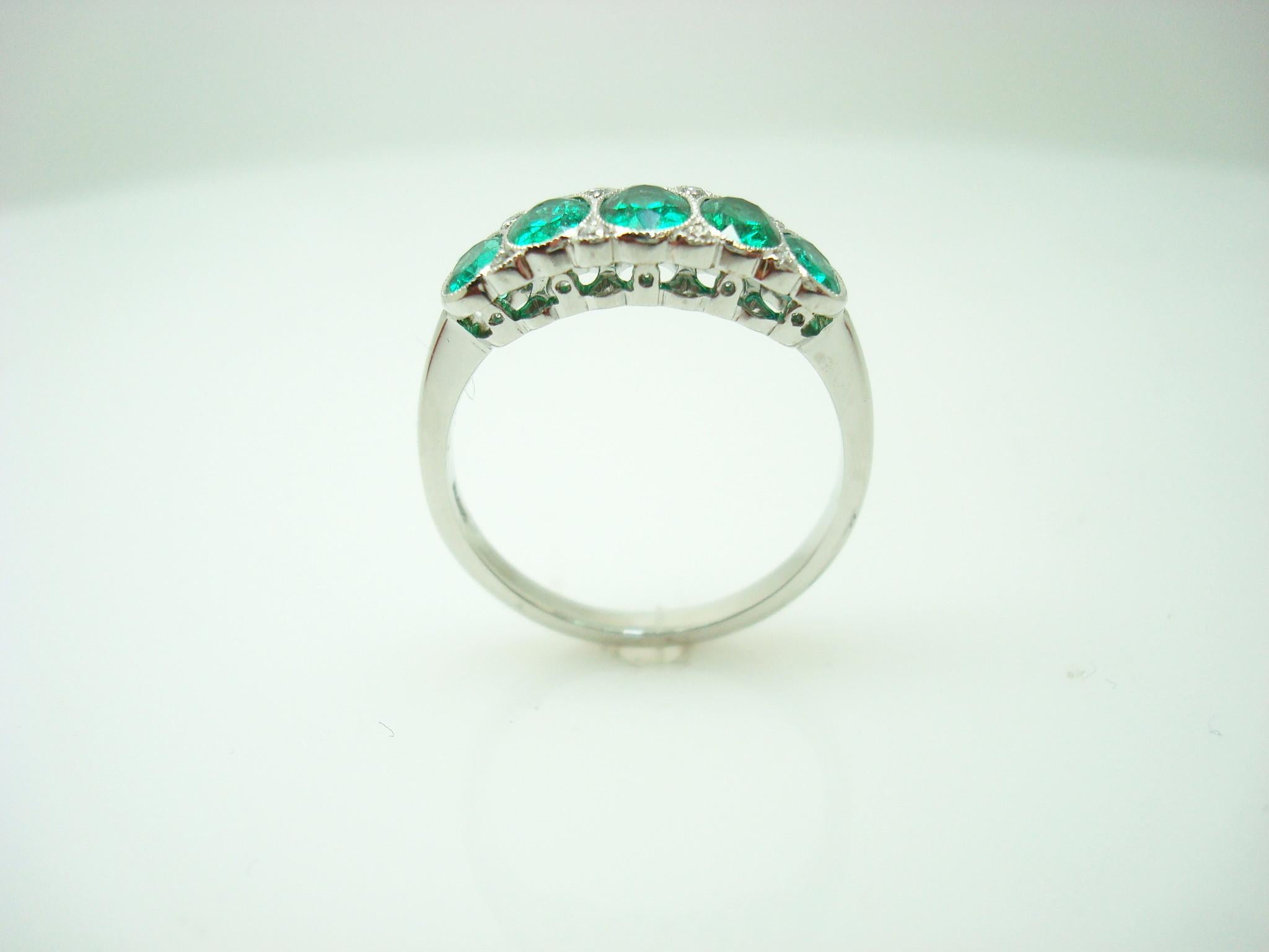 Contemporary Fine Platinum Emerald Diamond Band Ring For Sale