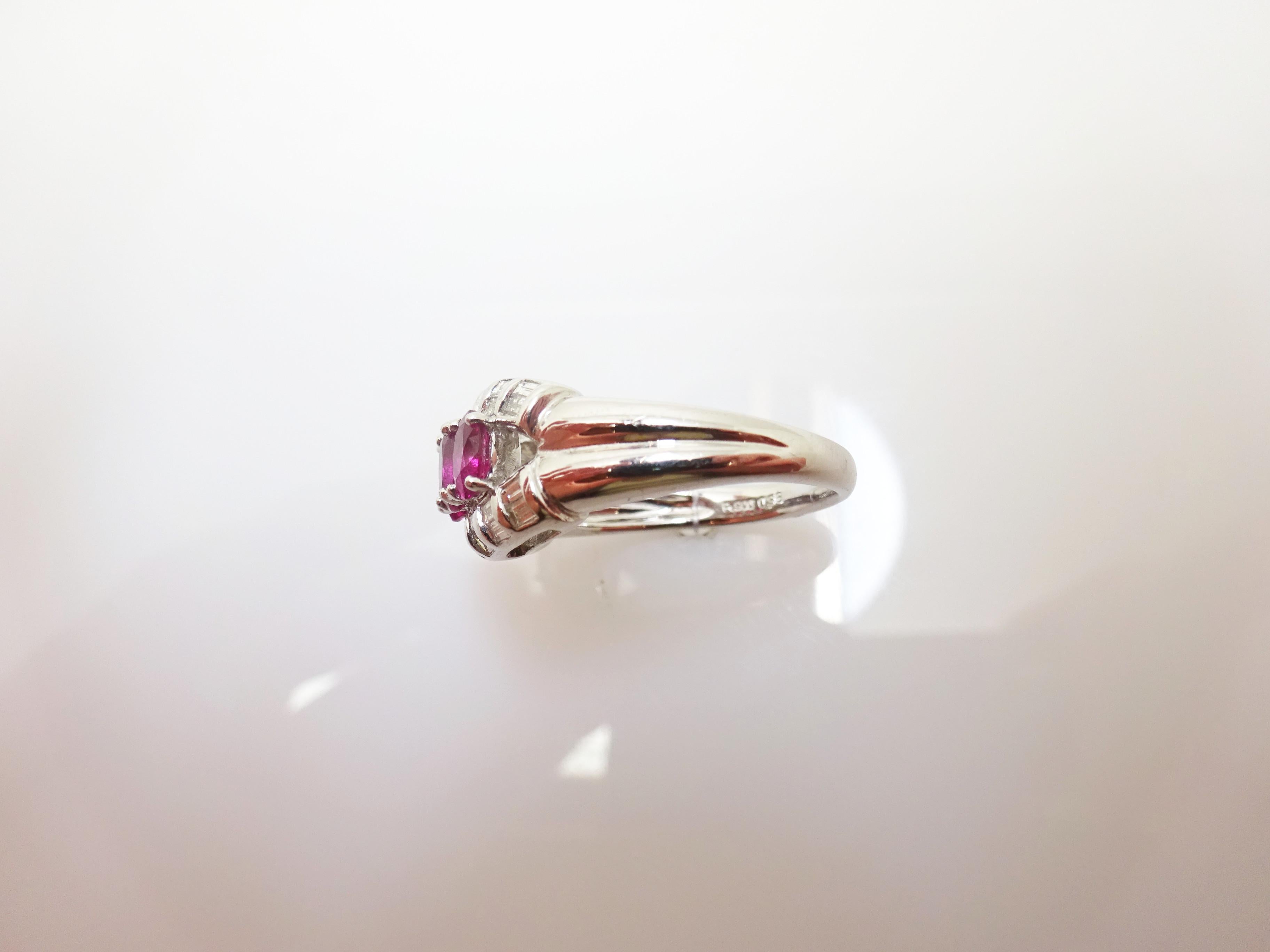 Fine Platinum Genuine Natural Ruby and Diamond Ring (#J3259)

Fine platinum ruby and diamond ring featuring three beautiful oval pinkish red earth mined rubies. The rubies have a total weight of .98cts and measure about 4.8mm x 3.4mm. The rubies are