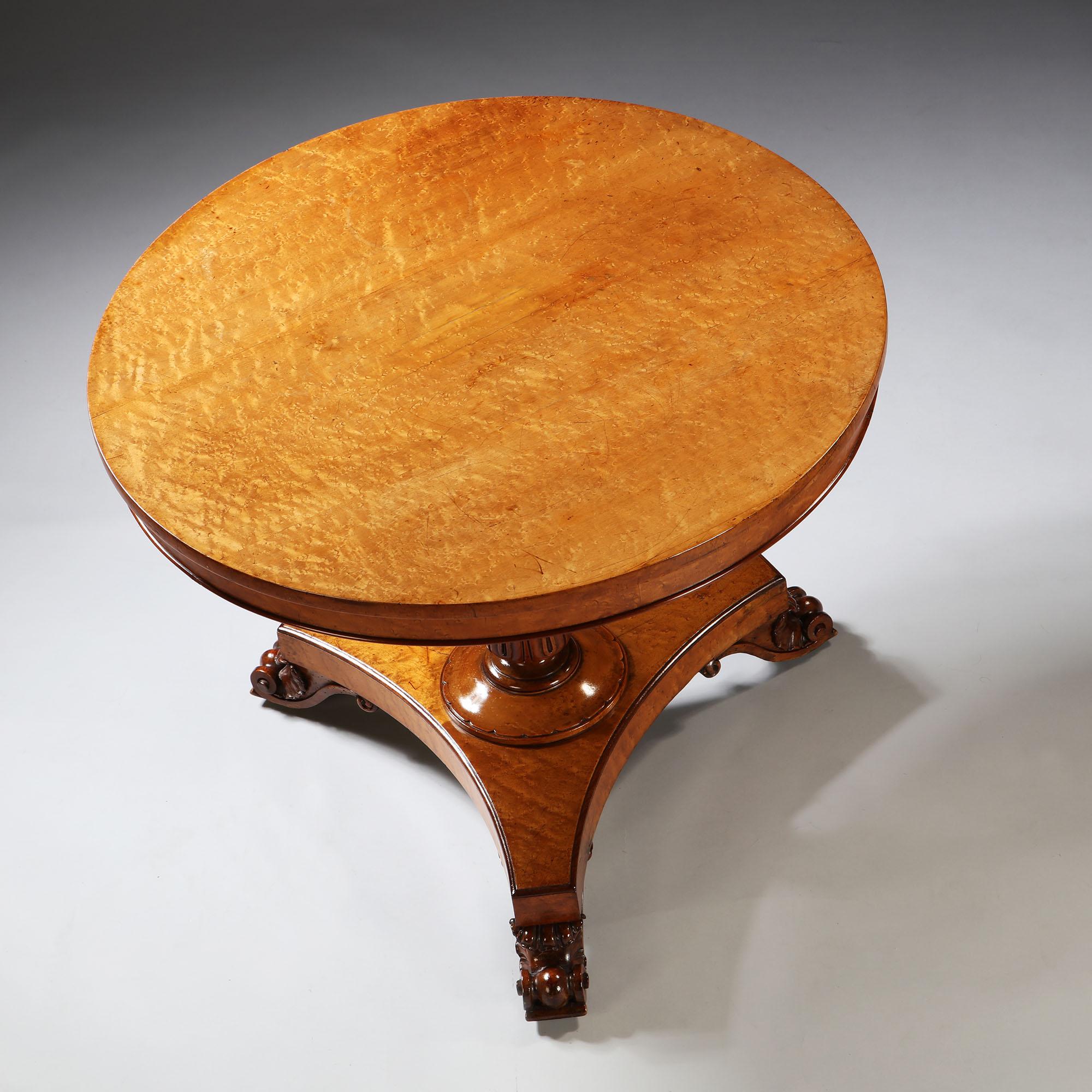 A fine pollard oak circular occasional table by George Morant & Son, with a finely figured top resting on a tripod base with scroll feet and stylized acanthus leaves to the upright.

Stamped to the underside: G I MORANT, 91 NEW BOND ST


The