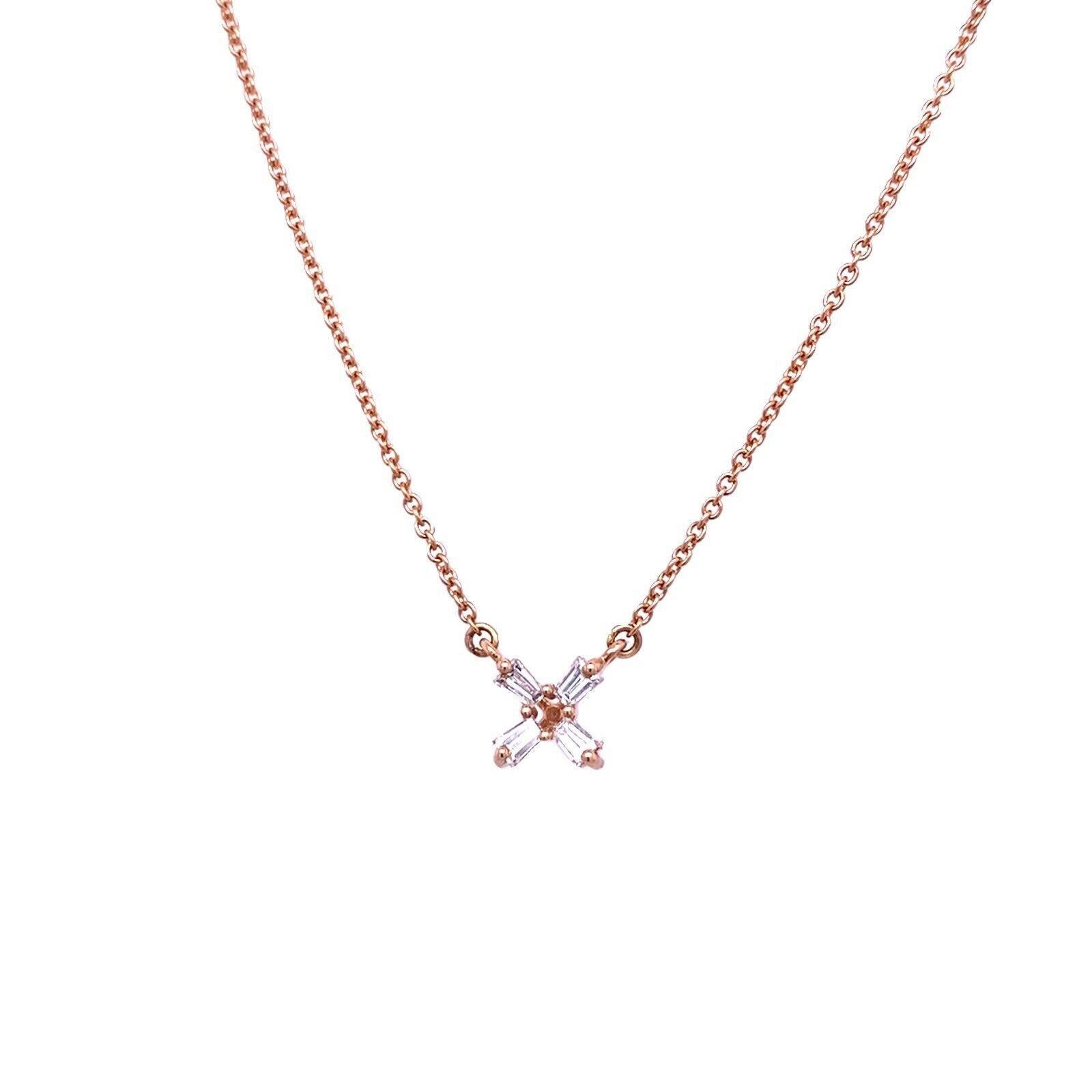 Fine Quality 0.23ct 4 F VS Baguette-Shape Diamond Pendant Set in 18ct Rose Gold

This gorgeous flower pendant is crafted in 18ct rose gold and features a total of 4 baguette-shaped diamonds. These diamonds have a total weight of 0.23ct. Its