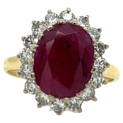 Fine Quality 18ct Yellow & White Gold Oval Shape Ruby & Diamond Cluster Ring