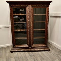 Fine Quality 19th Century Carved Oak Glazed Bookcase